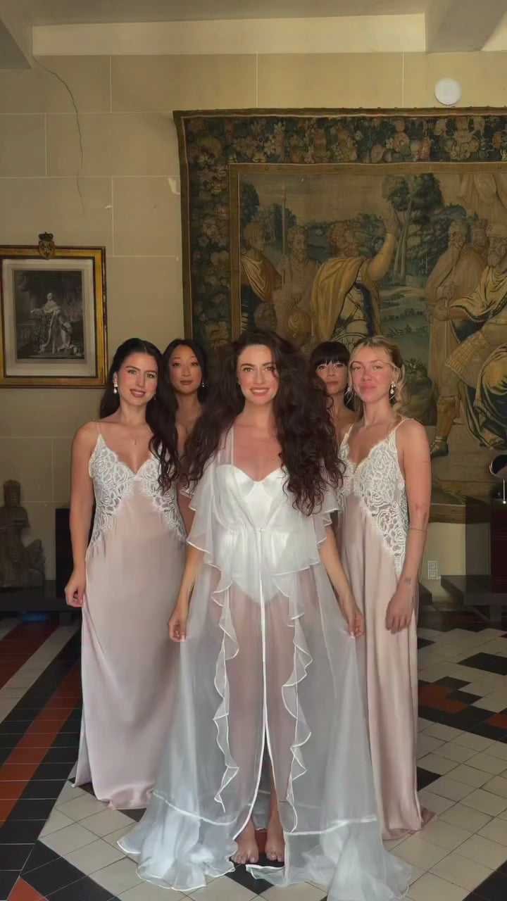 A beautiful moment with @leanneansar surrounded by love as she gets ready for forever. 🤍✨

Wearing our Rosalina Robe, she’s effortlessly elegant in those quiet, intimate moments before saying “I do.” The perfect morning, shared with the people who mean the most. 🕊️